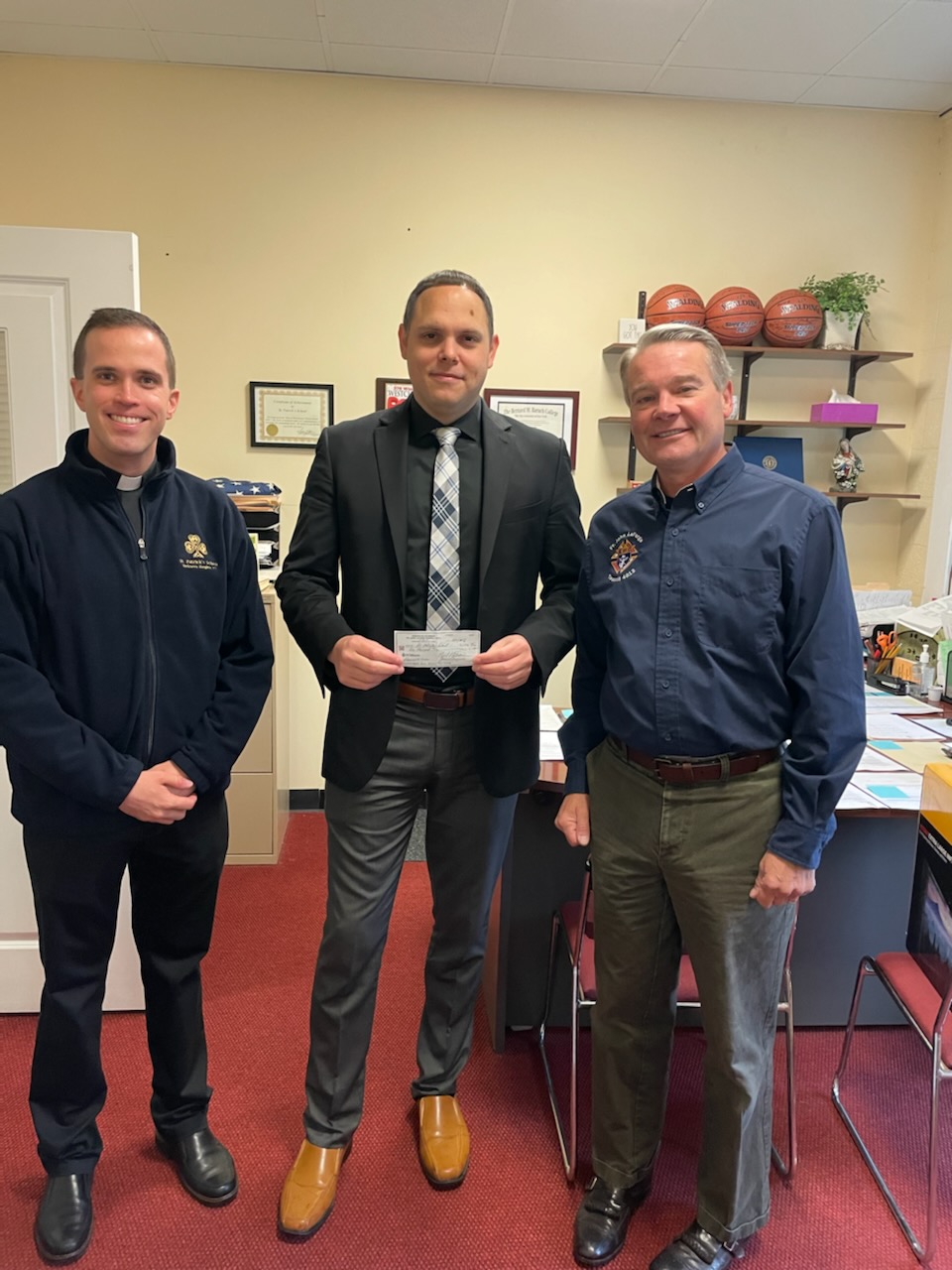 Presentation of Scholarship Check to St. Patrick's School Principal