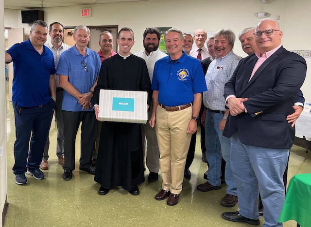 Presentation of Vestment and Donation to Fr. Ryan Muldoon